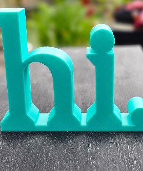 Schriftzug hi. in Türkis